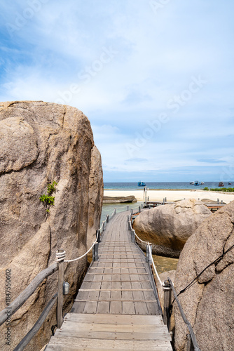 Wooden Boardwalk Through Rocky Cliffs Leading to Quiet Beaches Thailand’s Hidden Gem | Summer & Winter Tourism | Unspoiled Natural Beauty | Relaxing Coastal Retreat | Off-the-Beaten-Path Destination