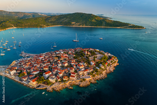 Foto Primosten, Croatia - Aerial view of Primosten peninsula and old town on a sunny summer morning in Dalmatia, Croatia