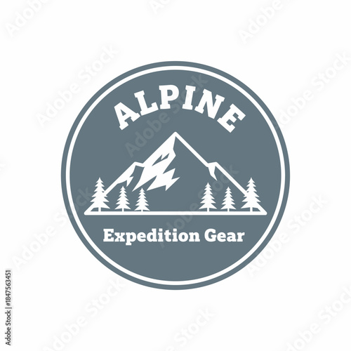 Vintage alpine logo featuring mountain peaks and pine trees, representing adventure, outdoor exploration, hiking, and premium expedition gear branding.