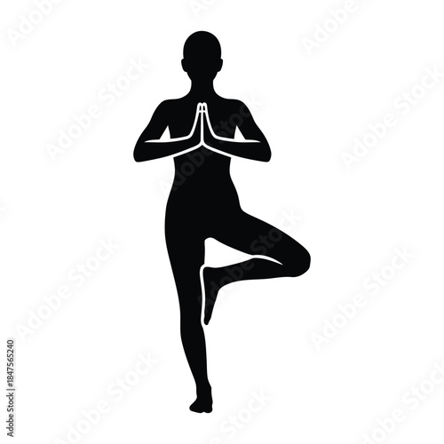Yoga practitioner in tree pose showing balance and mental focus