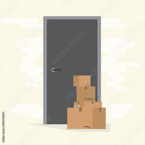 Cardboard boxes of different sizes stand in front of a closed door. Fast delivery. Contact free delivery, packages left next to the entrance, social distancing concept