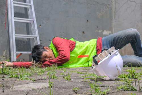 Tragic Construction Accident With Injured worker Lying on Ground at Dangerous, Active Building Site