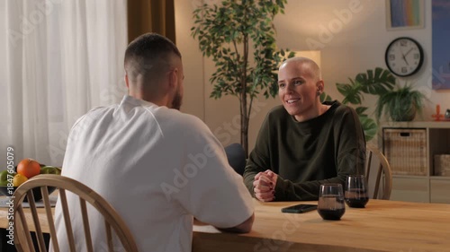 Woman talking with husband at home