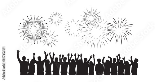 Silhouettes of happy people celebrating beneath a night sky filled with bursting fireworks