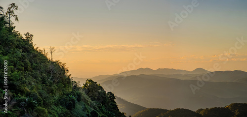 Fototapeta Naklejka Na Ścianę i Meble -  landscape view of sunset over mountain valley