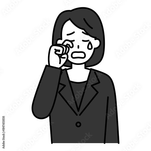 泣く喪服の女性