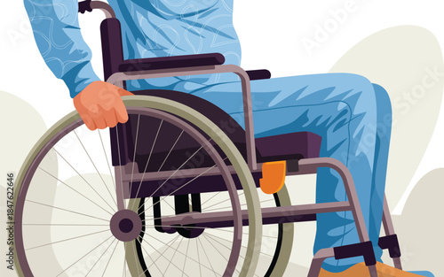 Person in blue medical attire sitting in a wheelchair viewed from the side