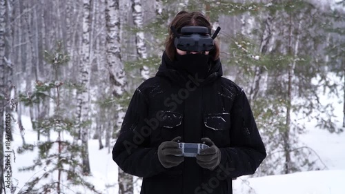 pilot controlling fpv drone through googles