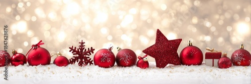 Festive Red Ornaments on Snow with Sparkling Bokeh Background