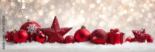 Festive Red Ornaments on Snow with Sparkling Bokeh Background