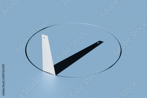 Foto Handsaw cutting perfect circle in a blue pastel surface