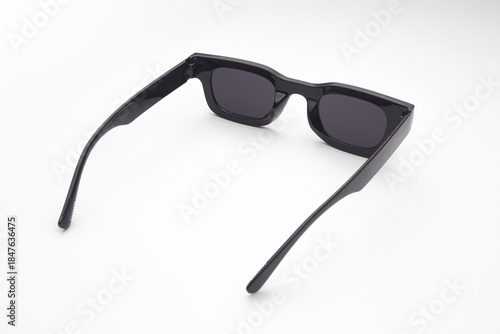 Trendy Black Sunglasses with Dark Lenses Isolated on White Background