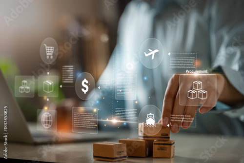 Businessman using laptop with small packages and modern logistics, procurement, shipping and supply chain management.