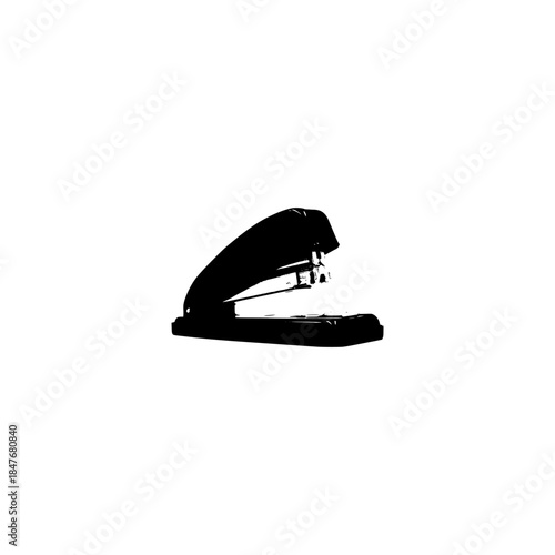 silhouette of a stapler machine