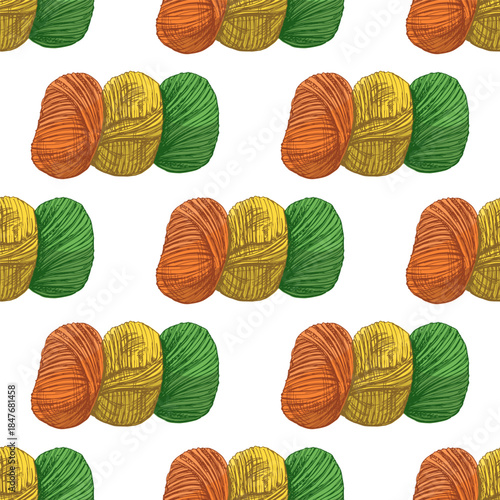 Hand drawn vintage seamless pattern of colorful skeins of yarn in orange, yellow and green, isolated illustration