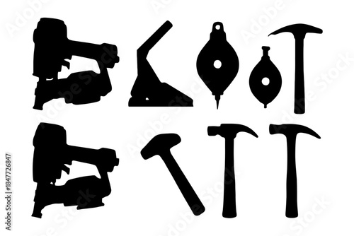 Silhouettes of construction tools including hammer and drill on white background.