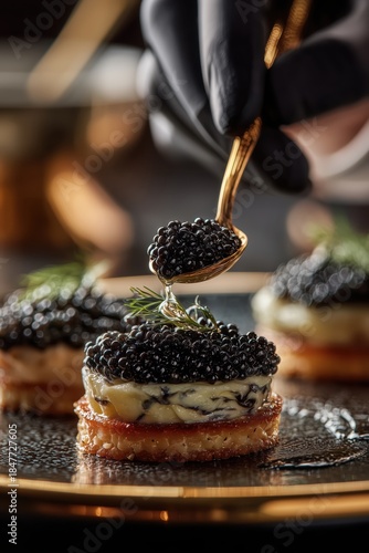 Delicate pearl spoon lifting black caviar to perfectly adorn gourmet dish in elegant setting