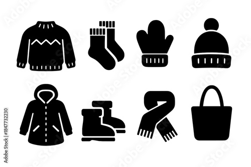 Cozy Winter Icons. Cozy winter wardrobe. Filled icon set of Cozy winter wardrobe: knitted sweater, wool socks,