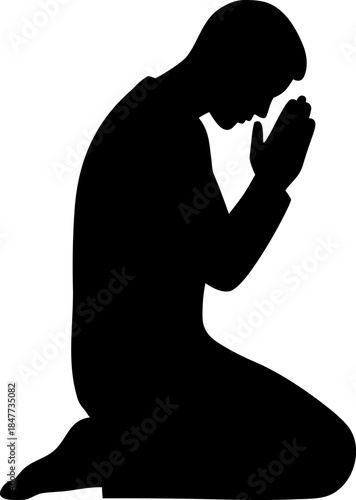 Kneeling Man Praying Silhouette in Spiritual Reflection.