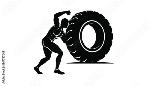 A person flips a large tire for a workout.