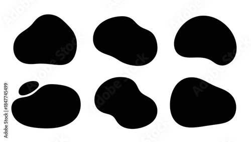 Abstract black shapes with smooth rounded edges arranged in a grid on a white background