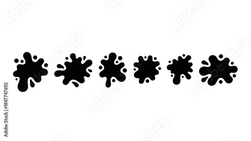 Collection of six black ink splatters and blots on a white background
