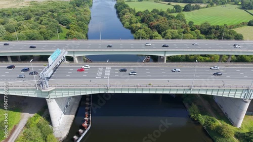 Wallpaper Mural M6 Motorway, Lymm, Cheshire, UK, August 15, 2025; aerial view of the M6 Motorway Thelwall Viaduct bridge over the Manchester Ship Canal and River Mersey, Lymm, Cheshire, UK. Torontodigital.ca