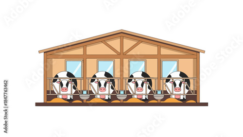 Cows in a barn with feeding troughs