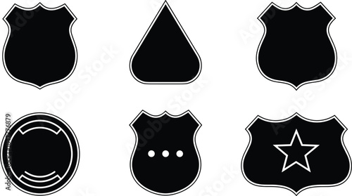 Group of graphic monochrome silhouette shapes for security, police, and military insignia featuring different crest and triangular designs.