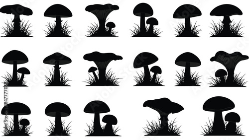 A collection of black mushroom silhouettes in various shapes and sizes with grass