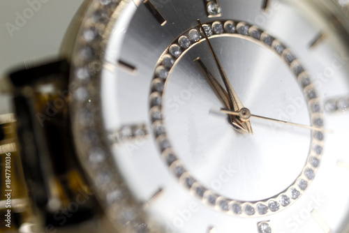 Scorpion hour and minute hands with stones inside the watch dial, macro