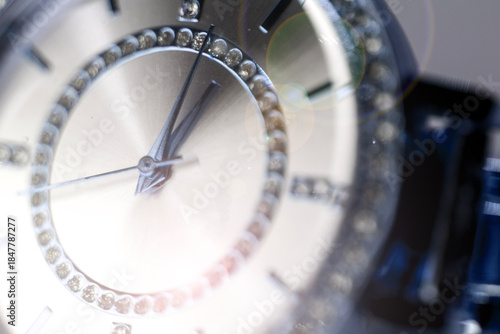 Fotografie Scorpion hour and minute  with stones inside the watch dial, macro