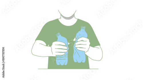 Man holding two plastic water bottles in green shirt