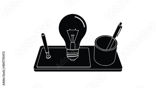 Simple desk setup with lightbulb and pen holder