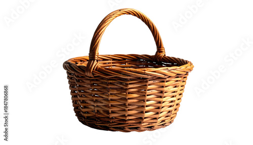 A close-up shot of a woven basket with a handle, showing its textured brown surface against a pure black background