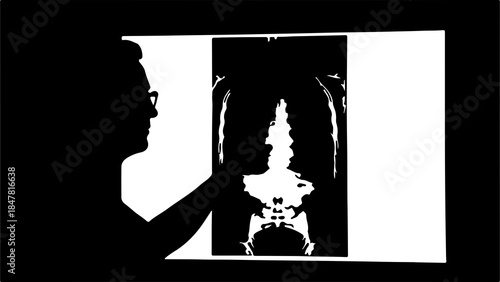 Doctor examining spine x-ray with patient silhouette
