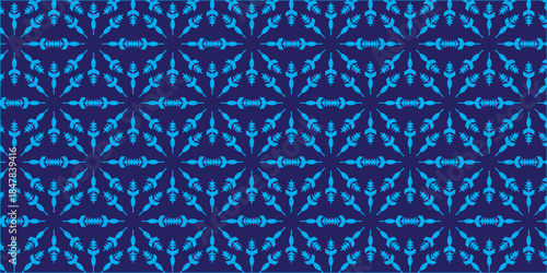 repeating geometric decorative pattern in bright blue tones on a dark blue background
