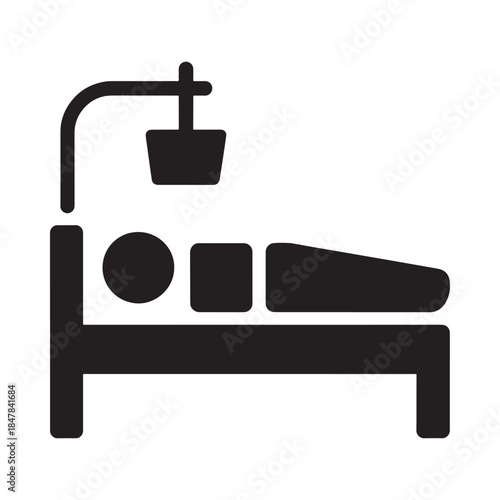 A simple black silhouette of a hospital bed and medical light above