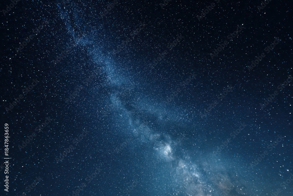 Fototapeta premium Cosmic quietude: wide-angle view of a lucid star field and distant galaxy in deep space