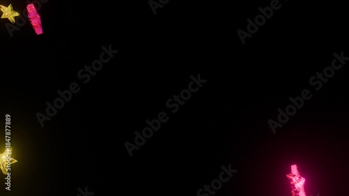 回転しながら落下するカラフルな星