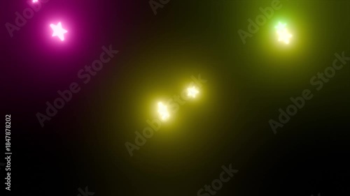 回転しながら落下するカラフルな星