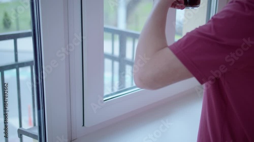 Enjoying a serene morning coffee while gazing out the window brings peace