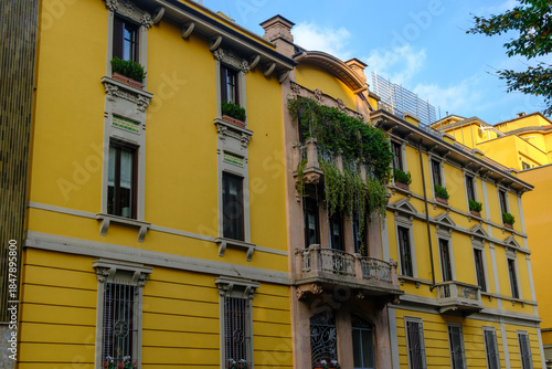 Old residential buildings along Via dei Praga in Milan, Italy