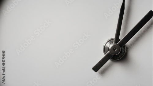 Close-up of a clock face with hands indicating the time.