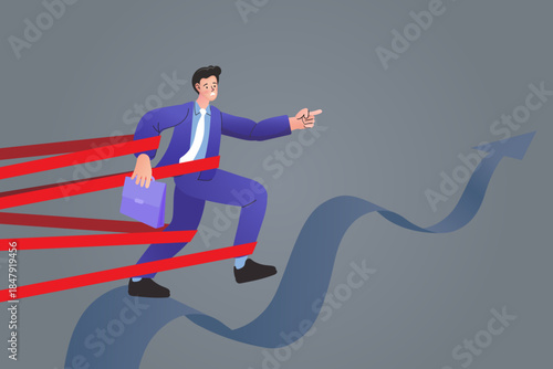 Businessman struggling to walk while wrapped in red tape ribbons. Concept of overcoming bureaucracy, strict regulations, and corporate restrictions to reach business success goal.