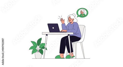 Happy elderly woman sitting at her desk, waving at the laptop screen during a video call with another senior person.