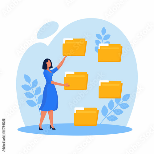 A woman manages and organizes digital files with folder icons in a workspace