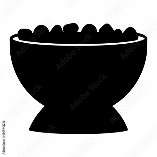 Black silhouette of a bowl filled with rounded items on white background