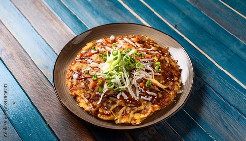 top view of okonomiyaki pancake on wood table