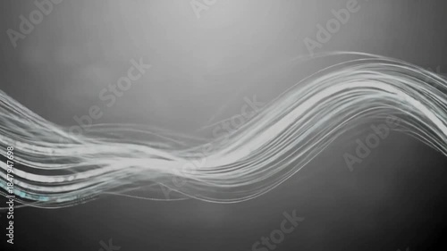 Abstract wave design with flowing lines on a grey background, creating a sense of movement and depth